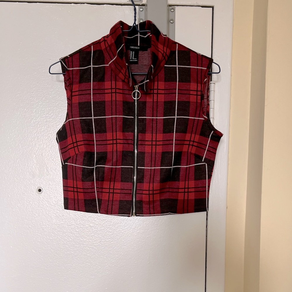 Free with purchase!! Plaid vest with front zip in size small